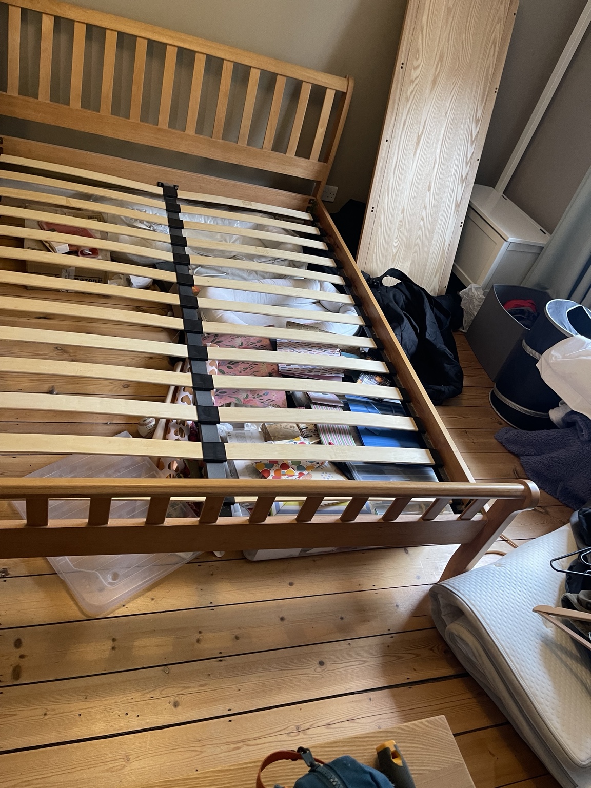 Wooden bed frame with slatted base