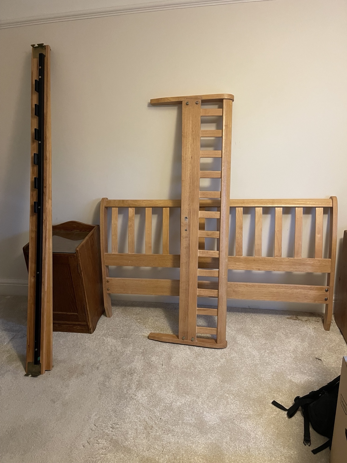 Wooden bed frame dismantled into components